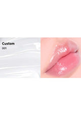 Close-up of glossy pink lip color swatch labeled 'Custom 001' on a white background.