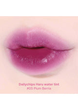 Lip with pink lip tint labeled 'Dailychips Haru water tint #05 Plum Berria' on a light pink background