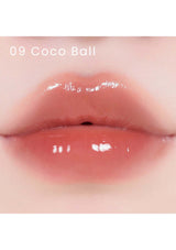 A collection of Alternative Stereo Lip Potion Sugar Glaze in various shades, displayed in small, clear bottles with pink labeling.