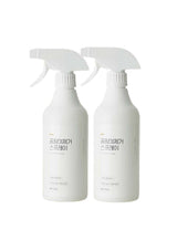 Two white spray bottles with Korean text on a white background