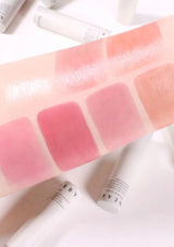 Color swatches of pink lipsticks on a white background