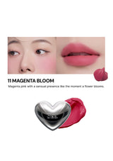Lipstick with a heart-shaped design on a white background, featuring text about the shade '11 Magenta Bloom'.