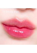 A collection of Alternative Stereo Lip Potion Sugar Glaze in various shades, displayed in small, clear bottles with pink labeling.