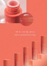 Lip gloss with 'VELVETY' branding on a coral background
