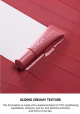 Pink lip balm on a red and white background with text about its formula.