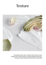 Close-up of a soapy texture with green leaves and petals on a white background.