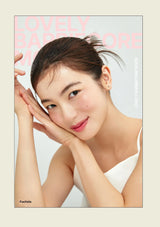 Woman with a soft smile and hands on face against a light background, with 'LOVELY BARBIE' text.