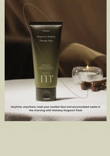 Molvany Mugwort Healing Therapy Pack on a textured surface with a candle in the background.