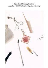 Collection of beauty tools and accessories on a white background with text promoting Scent Therapy.