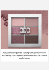 Makeup palette with four shades on a pink background, featuring the brand 'ODD'.
