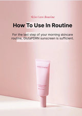 Pink skincare tube with text on a pink background