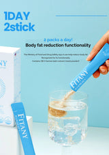 FITANY product being added to a glass of water with packaging in the background on a light blue background.