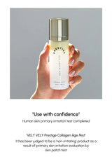 Hand holding a bottle of VELY VELY Prestige Collagen Age Mist with text about human skin primary irritation test.