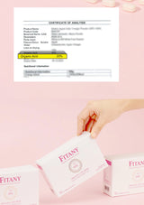 Fitany product packaging with a certificate of analysis on a pink background