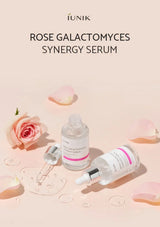 iUNIK Rose Galactomyces Synergy Serum with a dropper on a pink background