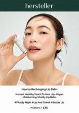 Person holding a skincare product with 'hersteller' branding on a plain background