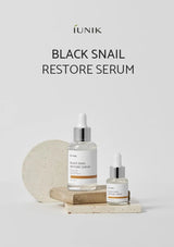 Black Snail Restore Serum by iUNIK on a light gray background