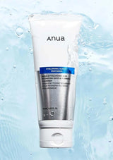 Anua skincare product on a blue water droplet background