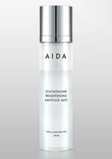 AIDA Glutathione Brightening Ampoule Mist bottle on a gray background