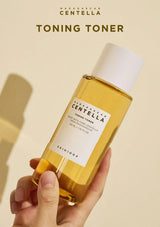 skin1004 centella tonning toner holdging by women