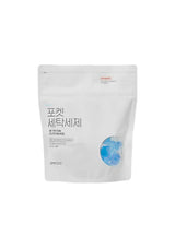 White packaging of a laundry detergent with Korean text and a blue icon on a white background