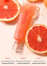 Flamer skincare product with grapefruit slices on a light background