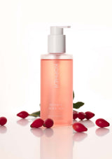 Kophier skincare product with red berries on a white background