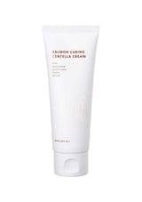 A tube of HEVEBLUE Salmon Caring Centella Cream against a beige background.