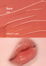 Lipstick swatch and application on a lip with '#Warm Light' color code.