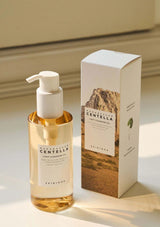 Skincare bottle and packaging with 'Centella' branding on a neutral background