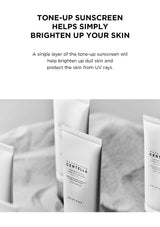 Sunscreen bottles with text about tone-up sunscreen on a light background