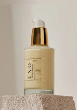 Skincare bottle labeled 'EXO Tightening' on a neutral background