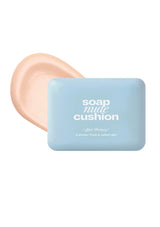 Bar of soap with a cushion on a white background