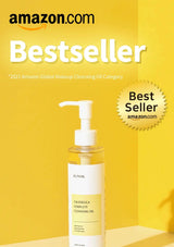 Makeup cleansing oil bottle with 'Best Seller' badge on a yellow background, featuring Amazon branding.