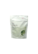 White packaging with green leaf design on a white background