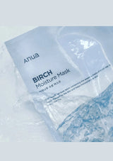 Anua Birch Moisture Mask packaging on a light blue background
