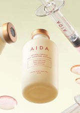 AIDA skincare product with syringe on a light background