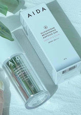 AIDA skincare product packaging on a light background