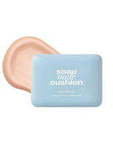 Bar of soap with a packaging labeled 'soap and cushion' on a white background