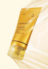 Medicube skincare product with a gold tube on a light background