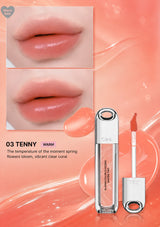 Lip gloss with packaging and application on lips on a white background