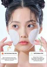 A close-up of a woman applying two white oval skincare pads to her cheeks and forehead, with text callouts describing a soft and moist jelly pad and a soft emboss pad.