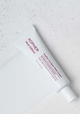 Kopher Purgepair White Cream tube on a light gray background