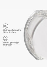 Close-up of a skincare product with droplet icons and text on a white background