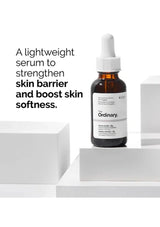 Bottle of 'The Ordinary' serum on a white background with text about skin barrier strength.