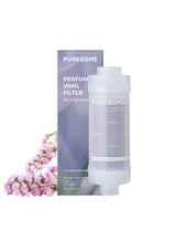 Puresome Perfume Vimil Filter set featuring a lavender-colored replacement filter bottle next to its matching purple packaging box, with decorative pink flowers on the left, set against a plain white background.