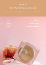 Product packaging with a label on a pink background, featuring text about 'Dive In Fig' fragrance.