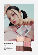 Woman holding a makeup product with color swatches below