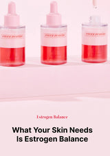 Three skincare bottles with red liquid and pink caps on a light pink background, featuring the brand 'every routine'.