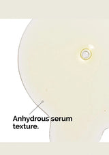 Close-up of a skincare product with 'Anhydrous serum texture' text on a light background